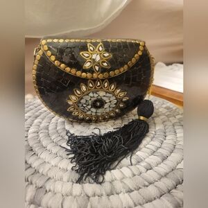 Elegant Black and Gold Clutch with Tassel